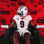 ### Georgia Bulldogs Land 5-Star WR: A Game-Changing Commitment In an electrifying turn of events, the Georgia Bulldogs have secured a commitment from one of the nation’s top high school prospects, a five-star wide receiver who is fully dedicated to UGA. This monumental decision not only bolsters the Bulldogs’ recruiting class but also signals the potential for a transformative impact on the team’s future. #### The Player: A Rising Star The newly committed wide receiver, whose name has been buzzing among college football circles, has consistently showcased exceptional talent on the field. Known for his speed, agility, and precise route-running, he has all the tools to become a standout in the SEC. With a frame that combines size and athleticism, he presents a matchup nightmare for defensive backs. His ability to make contested catches and his deep threat capability make him an invaluable asset to any offense. Throughout his high school career, he has accumulated impressive stats, breaking records and earning accolades that highlight his skill and work ethic. His performances have caught the eyes of scouts and coaches alike, leading to his five-star ranking—an honor reserved for the elite of the elite in high school football. #### Why Georgia? The decision to commit to Georgia comes as no surprise to many. The Bulldogs have established themselves as a powerhouse in college football, consistently competing at the highest level and producing NFL talent year after year. With head coach Kirby Smart at the helm, Georgia has not only excelled in recruiting but has also cultivated a culture of excellence and winning. The program’s commitment to developing players, combined with its state-of-the-art facilities and resources, makes it an attractive destination for top prospects. Furthermore, the Bulldogs’ offensive scheme is designed to highlight the skills of playmakers, providing a platform for wide receivers to thrive. With talented quarterbacks and a commitment to offensive innovation, the opportunity for this five-star prospect to make an immediate impact is immense. #### What This Means for UGA Landing a player of this caliber is a significant win for the Bulldogs. It enhances their already impressive recruiting class and adds depth to a position that is crucial for offensive success. As Georgia continues to build a roster capable of competing for national championships, securing commitments from elite prospects like this wide receiver is essential. This commitment not only adds talent but also sends a message to other recruits. The Bulldogs are serious contenders, and the program is on an upward trajectory. With this commitment, UGA can expect to see a ripple effect, as other high-profile recruits may take notice and consider joining the Bulldogs. #### The Future Looks Bright As the Bulldogs look ahead to the upcoming season and beyond, the addition of this five-star wide receiver signals a bright future. His commitment comes at a crucial time, as the team aims to build on recent successes and pursue another SEC title and a spot in the College Football Playoff. The excitement surrounding this commitment also energizes the fan base. Georgia fans are known for their passionate support, and the prospect of watching a dynamic playmaker in red and black only heightens that enthusiasm. The anticipation of seeing this talented wide receiver catch passes in Sanford Stadium is already generating buzz among supporters and analysts alike. #### Conclusion In the world of college football recruiting, few moments are as significant as landing a five-star prospect. For the Georgia Bulldogs, securing a commitment from this elite wide receiver is a game-changer. It not only strengthens their roster but also reinforces Georgia’s status as a premier destination for top talent. As the Bulldogs prepare for the upcoming season, the excitement surrounding this commitment is palpable. With a strong core of players, an elite coaching staff, and a culture of success, Georgia is poised to make a serious run at national glory. The addition of this talented wide receiver is just the beginning, and the future of Georgia Bulldogs football looks incredibly promising. Fans can’t wait to see what’s next!