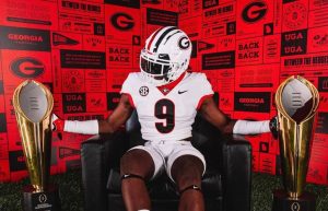 ### Georgia Bulldogs Land 5-Star WR: A Game-Changing Commitment In an electrifying turn of events, the Georgia Bulldogs have secured a commitment from one of the nation’s top high school prospects, a five-star wide receiver who is fully dedicated to UGA. This monumental decision not only bolsters the Bulldogs’ recruiting class but also signals the potential for a transformative impact on the team’s future. #### The Player: A Rising Star The newly committed wide receiver, whose name has been buzzing among college football circles, has consistently showcased exceptional talent on the field. Known for his speed, agility, and precise route-running, he has all the tools to become a standout in the SEC. With a frame that combines size and athleticism, he presents a matchup nightmare for defensive backs. His ability to make contested catches and his deep threat capability make him an invaluable asset to any offense. Throughout his high school career, he has accumulated impressive stats, breaking records and earning accolades that highlight his skill and work ethic. His performances have caught the eyes of scouts and coaches alike, leading to his five-star ranking—an honor reserved for the elite of the elite in high school football. #### Why Georgia? The decision to commit to Georgia comes as no surprise to many. The Bulldogs have established themselves as a powerhouse in college football, consistently competing at the highest level and producing NFL talent year after year. With head coach Kirby Smart at the helm, Georgia has not only excelled in recruiting but has also cultivated a culture of excellence and winning. The program’s commitment to developing players, combined with its state-of-the-art facilities and resources, makes it an attractive destination for top prospects. Furthermore, the Bulldogs’ offensive scheme is designed to highlight the skills of playmakers, providing a platform for wide receivers to thrive. With talented quarterbacks and a commitment to offensive innovation, the opportunity for this five-star prospect to make an immediate impact is immense. #### What This Means for UGA Landing a player of this caliber is a significant win for the Bulldogs. It enhances their already impressive recruiting class and adds depth to a position that is crucial for offensive success. As Georgia continues to build a roster capable of competing for national championships, securing commitments from elite prospects like this wide receiver is essential. This commitment not only adds talent but also sends a message to other recruits. The Bulldogs are serious contenders, and the program is on an upward trajectory. With this commitment, UGA can expect to see a ripple effect, as other high-profile recruits may take notice and consider joining the Bulldogs. #### The Future Looks Bright As the Bulldogs look ahead to the upcoming season and beyond, the addition of this five-star wide receiver signals a bright future. His commitment comes at a crucial time, as the team aims to build on recent successes and pursue another SEC title and a spot in the College Football Playoff. The excitement surrounding this commitment also energizes the fan base. Georgia fans are known for their passionate support, and the prospect of watching a dynamic playmaker in red and black only heightens that enthusiasm. The anticipation of seeing this talented wide receiver catch passes in Sanford Stadium is already generating buzz among supporters and analysts alike. #### Conclusion In the world of college football recruiting, few moments are as significant as landing a five-star prospect. For the Georgia Bulldogs, securing a commitment from this elite wide receiver is a game-changer. It not only strengthens their roster but also reinforces Georgia’s status as a premier destination for top talent. As the Bulldogs prepare for the upcoming season, the excitement surrounding this commitment is palpable. With a strong core of players, an elite coaching staff, and a culture of success, Georgia is poised to make a serious run at national glory. The addition of this talented wide receiver is just the beginning, and the future of Georgia Bulldogs football looks incredibly promising. Fans can’t wait to see what’s next!